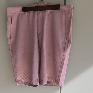 Men's Travis Mathew’s soft red Golf Shorts